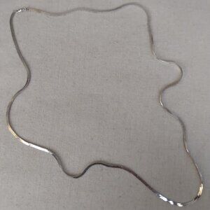 Monet: Vintage silver tone herringbone necklace.